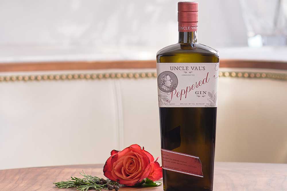 gin bottle and red rose