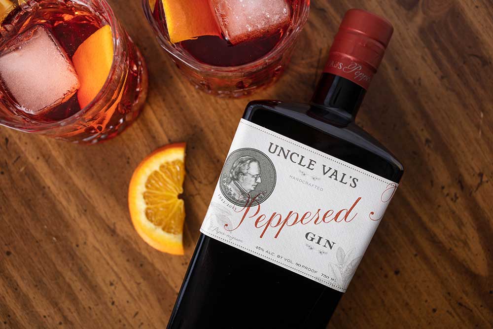 UntappedMedia_3Badge-cocktails-feb2019_3Z2A0177_web gin bottle on table with cocktails